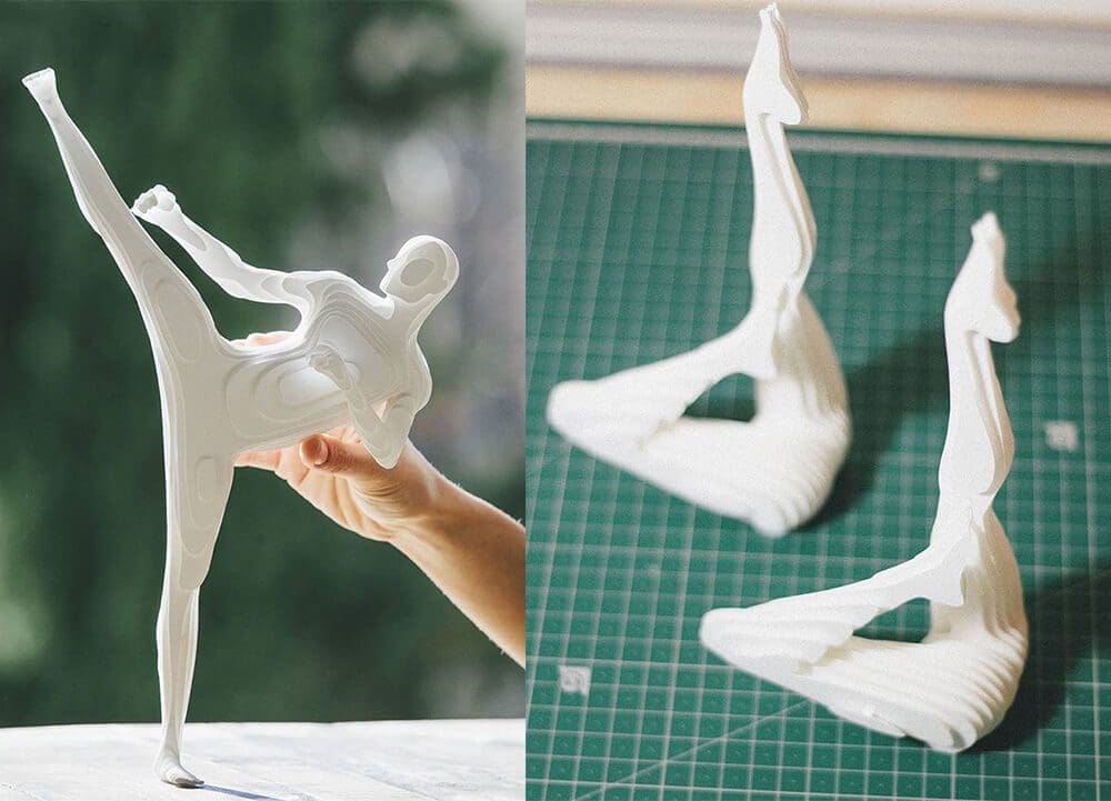 Esculturas de atletas hechas con capas de papel 5