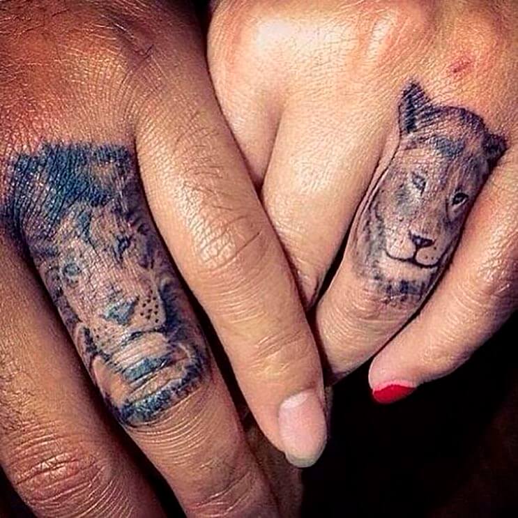 Un león y una leona tatuaje